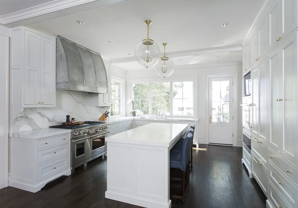 White kitchen with range hood
